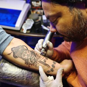 custom tattoo design being created by tattoo artist in gurgaon